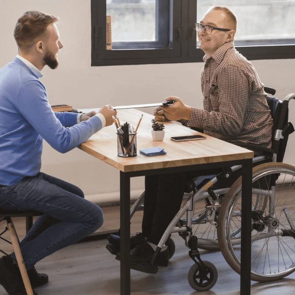 Man is doing a wheelchair assessment
