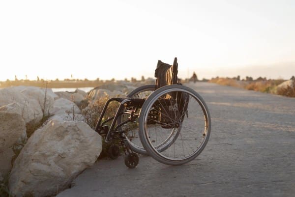 6 wheelchair lifestyle concept beach scaled 1